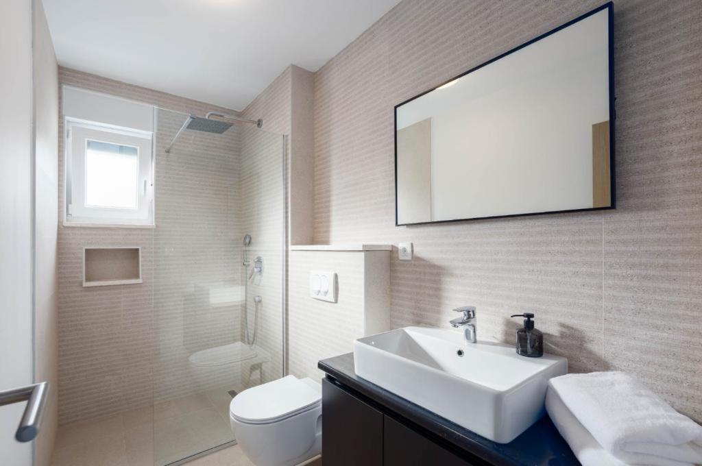Apartment Pilic Marina Esterno foto
